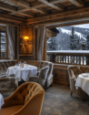 A fine dining restaurant with a view of the French Alps in Courchevel, France